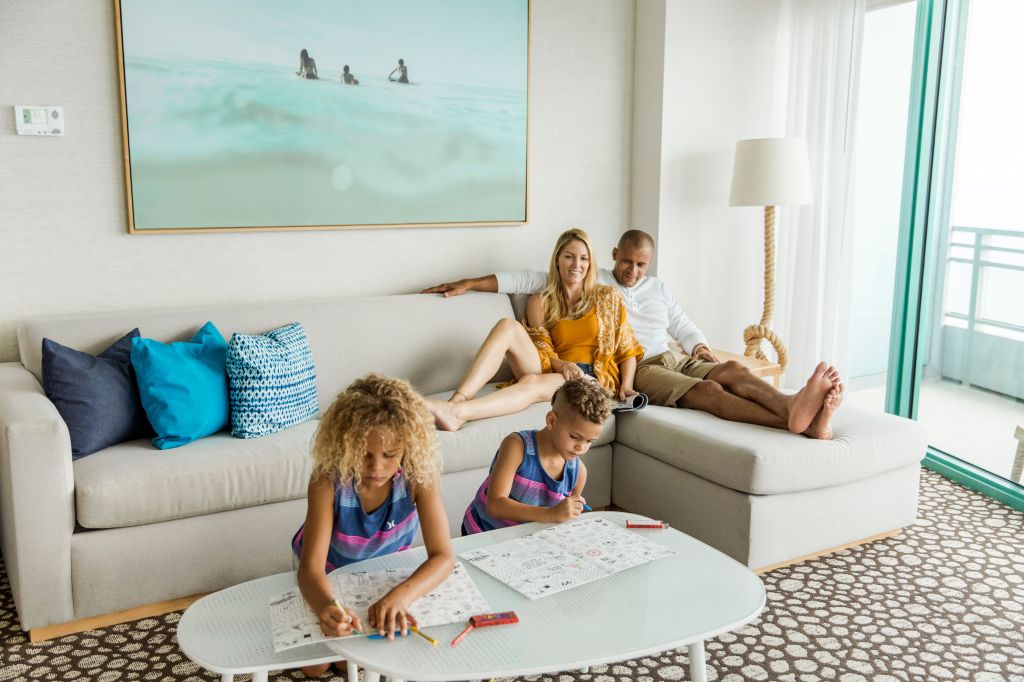 The Diplomat Beach Resort Hollywood, Curio Collection by Hilton, 1 King, 2 Double Two Bedroom Oceanfront Family Suite, kids coloring, parents lounging on couch